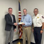 Presenting the donation from the Knights