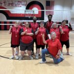 Miami County Special Olympics volleyball and powerlifting athletes posing